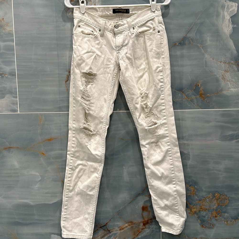 Levi’s ripped white skinny jeans